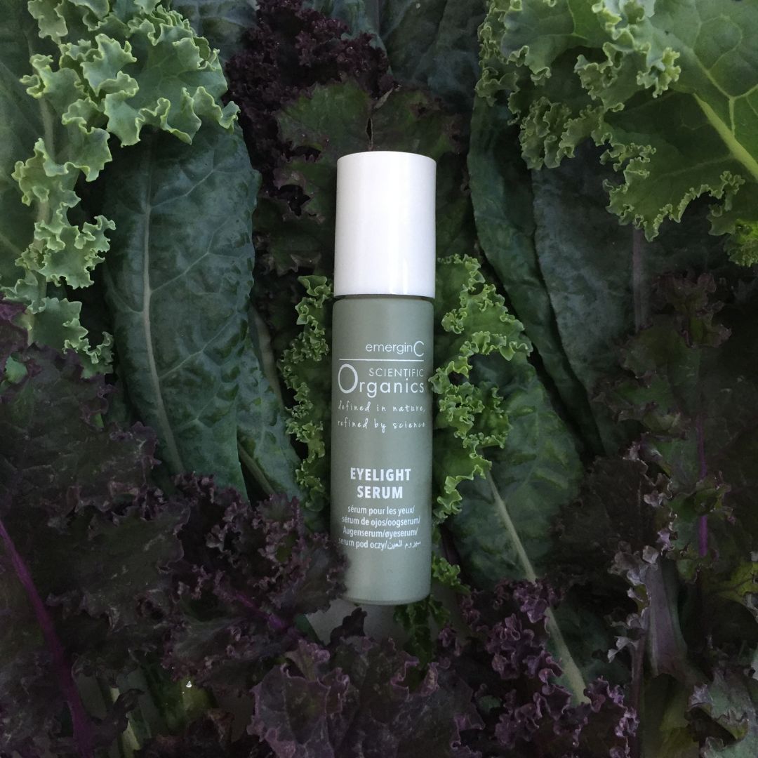 A creative product shot featuring Emergin C Scientific Organics Eyelight Serum on a leafy background, uploaded on Spa Circle Brands product listing page.